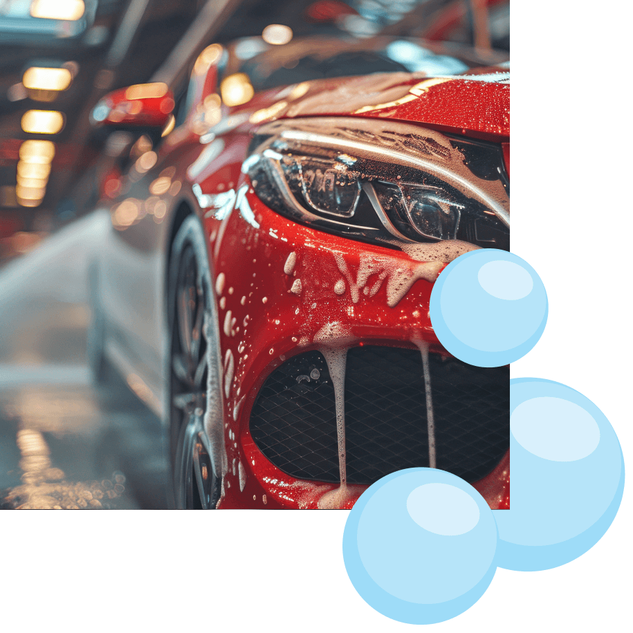 A sparkling clean red sports car at Suds McClean Car Wash